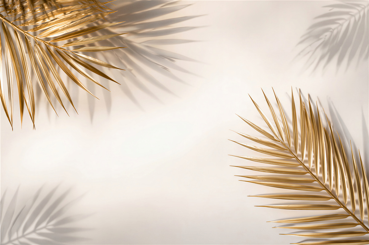 Fototapeten Goldene Palmblätter mit Schatten